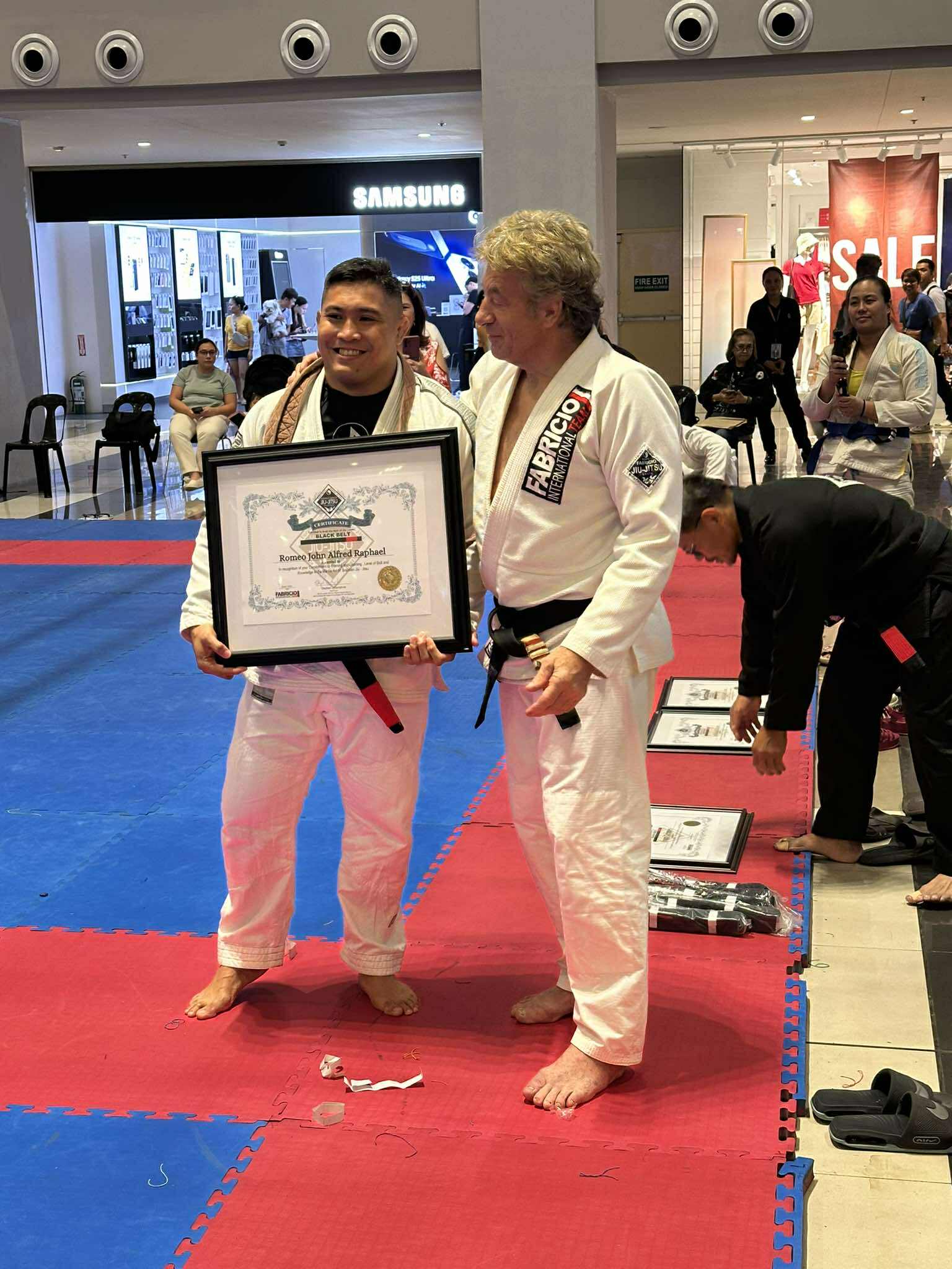 Romeo's black belt promotion with Stephen